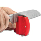 Full image of a knife getting sharpened with the Mini 2 Step Knife Sharpener.